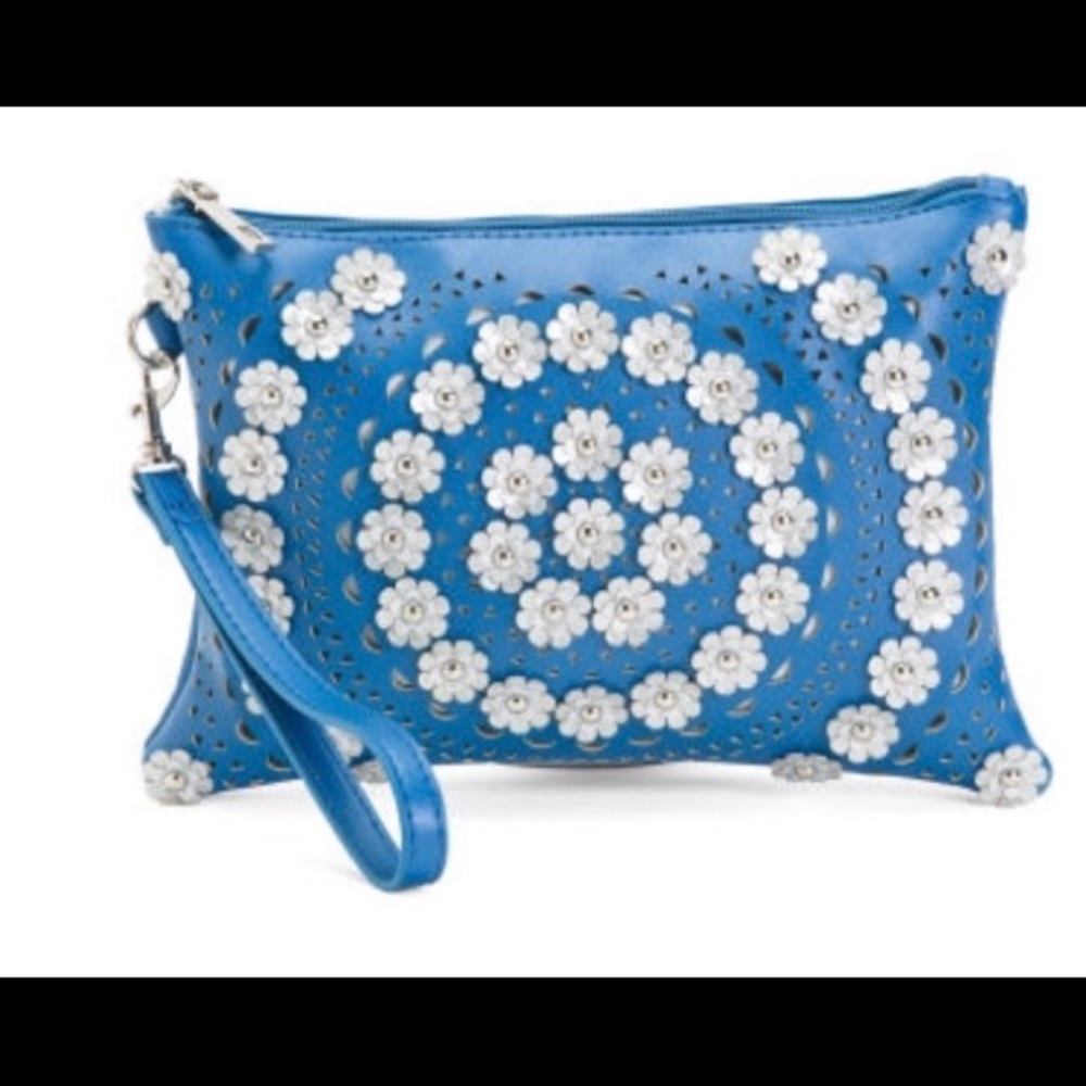 Blue NWT Perforated Punch Out Design Wristlet